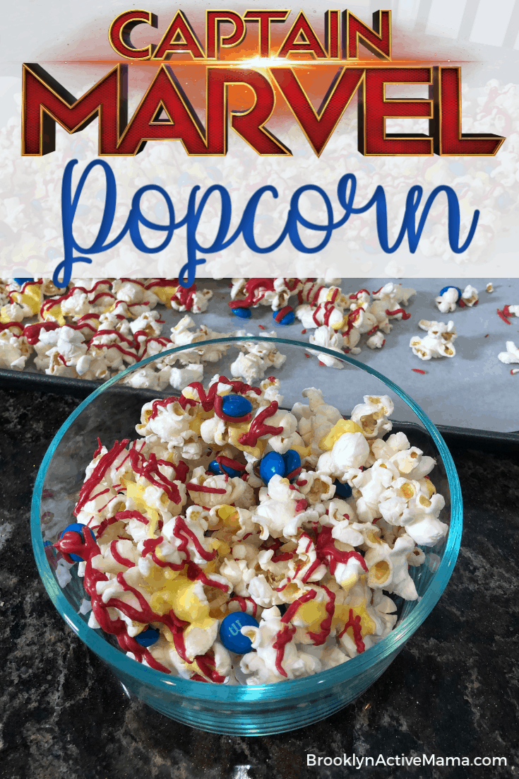 Looking for a fun new popcorn recipe for movie night? Check out this sweet Captain Marvel themed popcorn with red, blue and yellow -- the colors of the movie! #captainmarvel #disneyrecipes