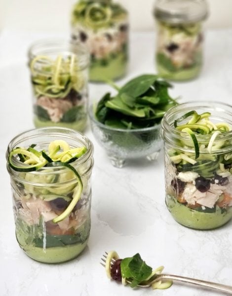 This Zucchini Noodle Salad with chicken recipe is fun to make and put in a mason jar for an easy healthy make ahead lunch for work. Clean eating made super easy with meal prepping. #mealprep #cleaneats