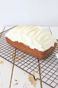 This Gingerbread Loaf with Cream Cheese Icing is perfect for holiday gifts or Christmas parties! Celebrate the season with this amazing recipe!