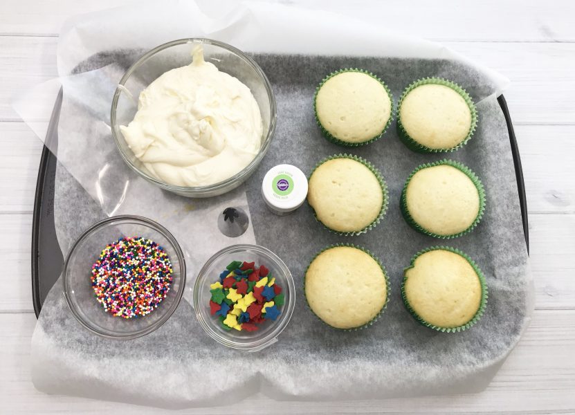 These Christmas Tree Cupcakes are so fun and festive! You can use store bought or your own homemade cupcake recipe for these delicious treats! They are perfect for holiday parties, bake sales and so much more. The pretty green color makes it super attractive to anyone!