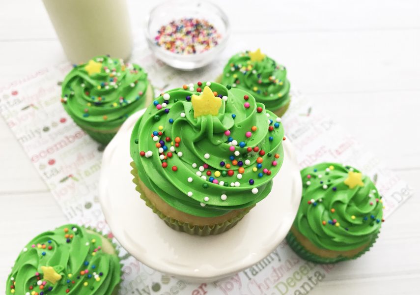 These Christmas Tree Cupcakes are so fun and festive! You can use store bought or your own homemade cupcake recipe for these delicious treats! They are perfect for holiday parties, bake sales and so much more. The pretty green color makes it super attractive to anyone!