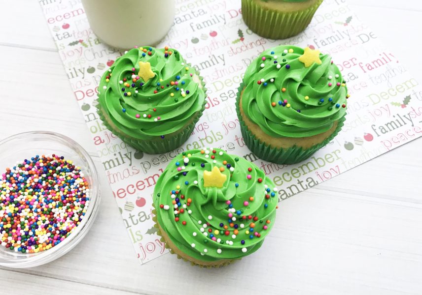 These Christmas Tree Cupcakes are so fun and festive! You can use store bought or your own homemade cupcake recipe for these delicious treats! They are perfect for holiday parties, bake sales and so much more. The pretty green color makes it super attractive to anyone!