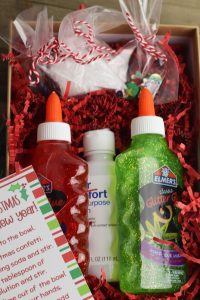 This DIY Slime Maker Box Craft can be a great activity for you and the kids to do, it can also be a really fun gift to make for others too! This is a fantastic last minute birthday gift plus it comes with a free printable gift tag! This sensory gift is perfect to keep the kids busy for hours. #slime #slimecraft #slimegift #slimeobsessed #DIYChristmasgift #giftsforkids