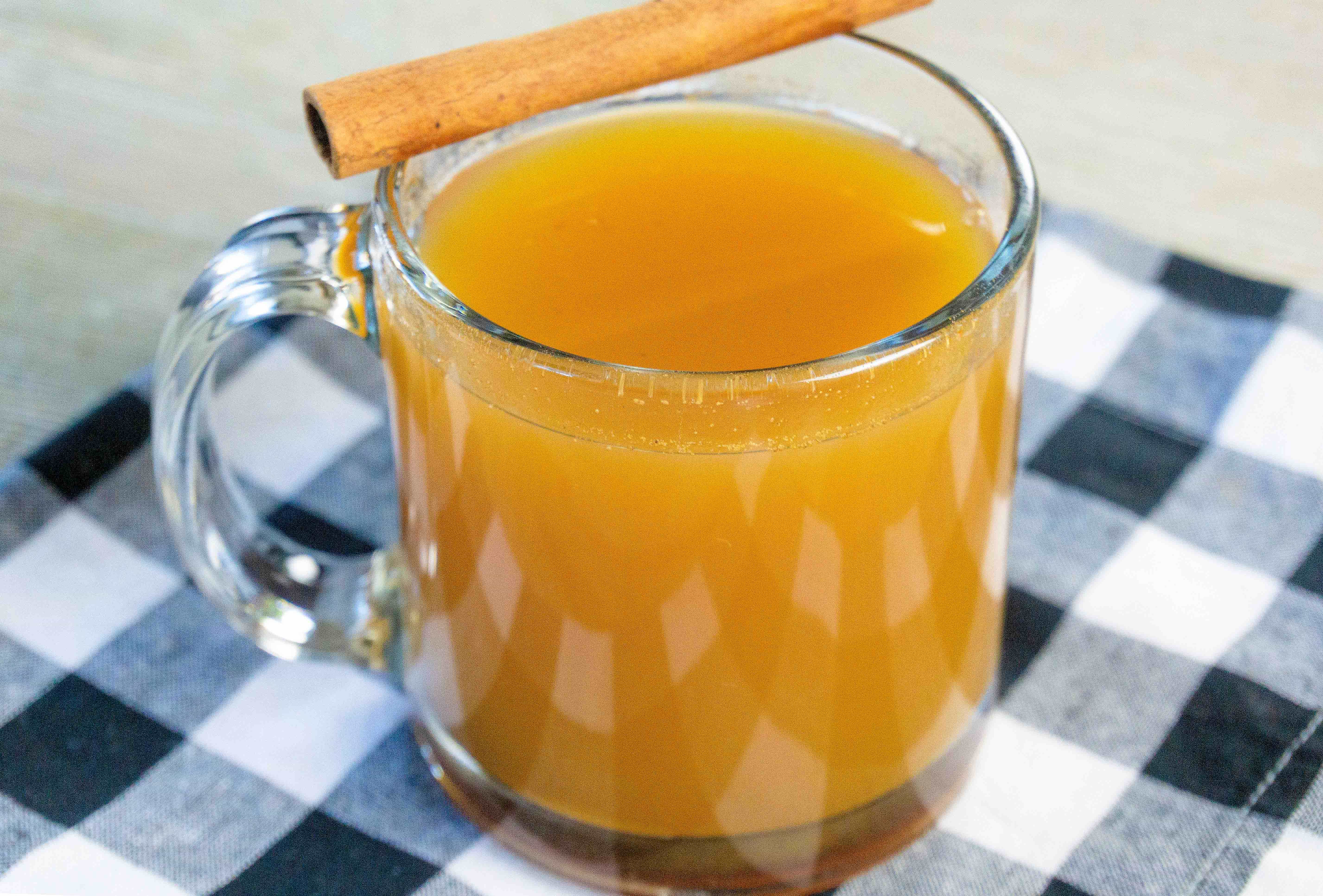 This amazing easy and delicious instant pot pumpkin apple cider is perfect for cold days! Heat this up during the winter months for a tasty treat! This easy 3 ingredient recipe is easy to make and can be done in just a few minutes! There is no pressure needed for this instant pot recipe! #instantpotdrinks #instantpot #pumpkindrinks