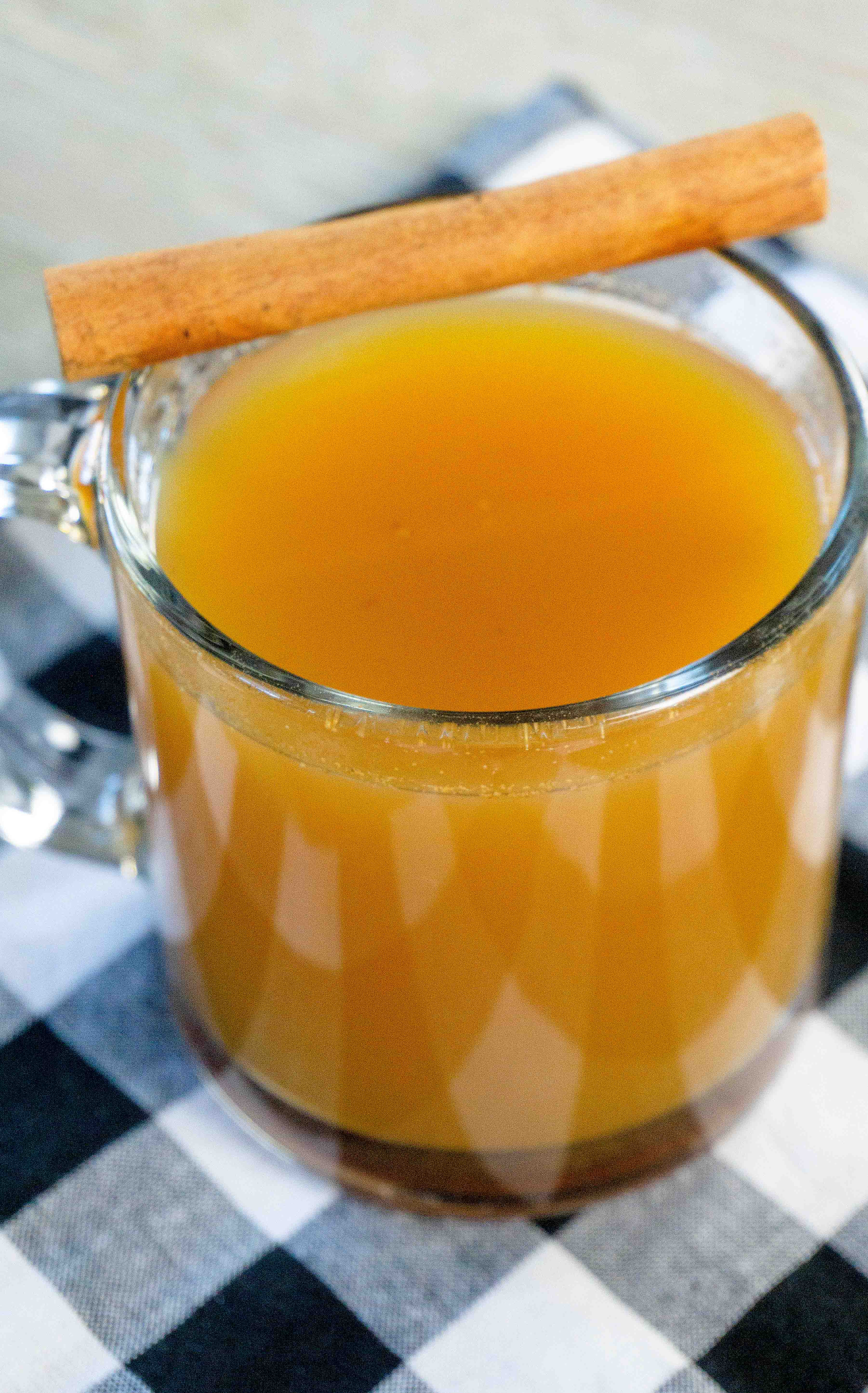 This amazing easy and delicious instant pot pumpkin apple cider is perfect for cold days! Heat this up during the winter months for a tasty treat! This easy 3 ingredient recipe is easy to make and can be done in just a few minutes! There is no pressure needed for this instant pot recipe! #instantpotdrinks #instantpot #pumpkindrinks