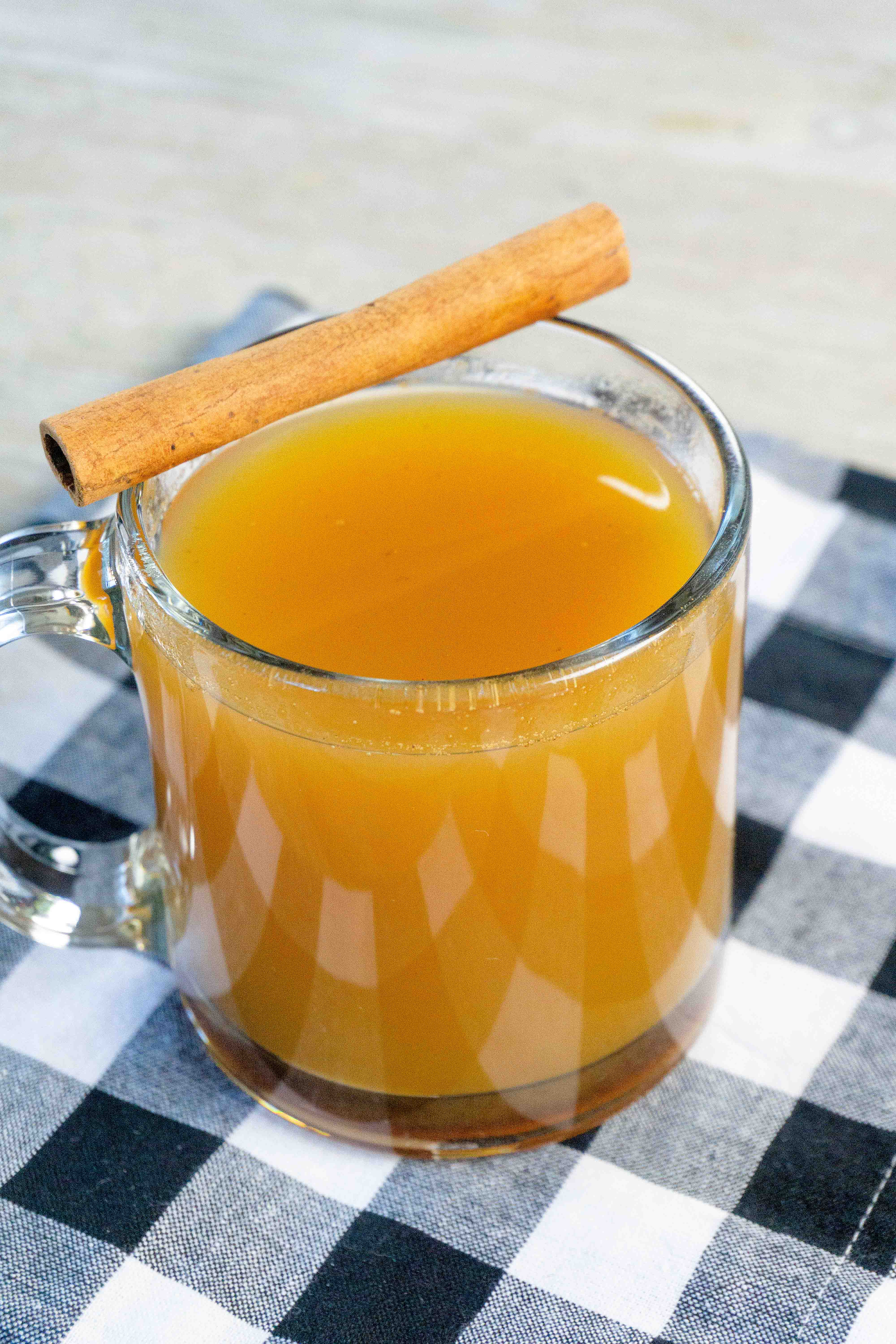 This amazing easy and delicious instant pot pumpkin apple cider is perfect for cold days! Heat this up during the winter months for a tasty treat! This easy 3 ingredient recipe is easy to make and can be done in just a few minutes! There is no pressure needed for this instant pot recipe! #instantpotdrinks #instantpot #pumpkindrinks