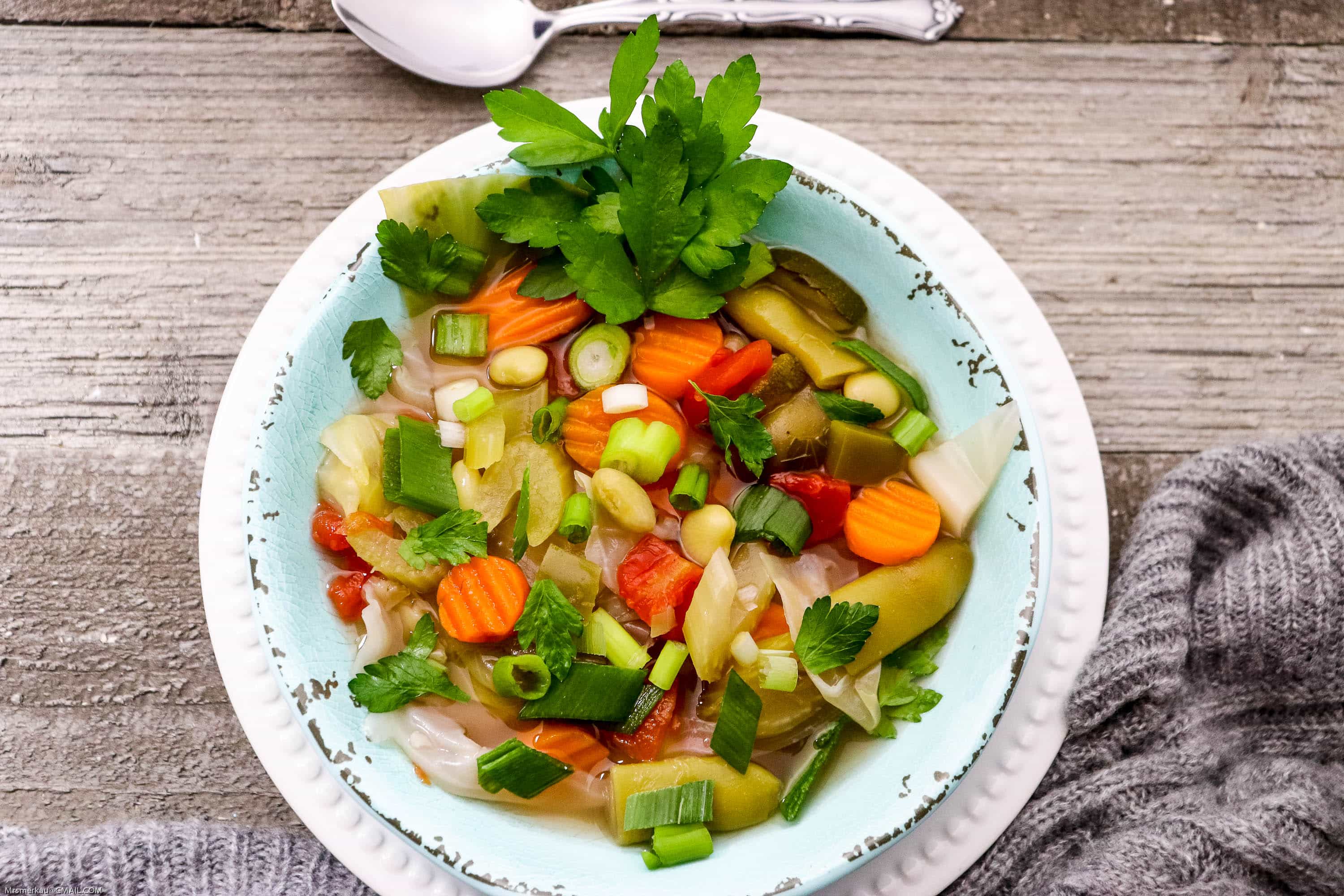 Check out this yummy and hearty homemade vegetable soup recipe filled with tons of nutrients and immunity building veggies! This vegetarian recipe will help fight the flu and is full of flavor! Easy to follow, you may already have all you need to make this yummy soup! #vegetablesoup #vegetarian #vegetables #healthyeating