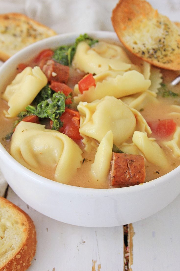 This is a wonderful hearty soup to make on a cool Fall day, or chilly Winter night. It's packed with spices and flavors that blend together for a delicious bowl of healthy goodness. Serve this with some crusty garlic bread, or bread sticks, and you have a great meal everyone will love. #soups #pastasoup #tortellinisoup