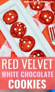Here is a fun recipe for White Chocolate Chip Valentine's Day Cookies that you can bake for the sweethearts in your life! They are super festive and fun with a bright red color. Made super quick with red velvet cake mix and white chocolate chips, it's a super fun treat to make with the kids or for your love! #valentinesday #valentinesdaycookies #valentinesdaysweets