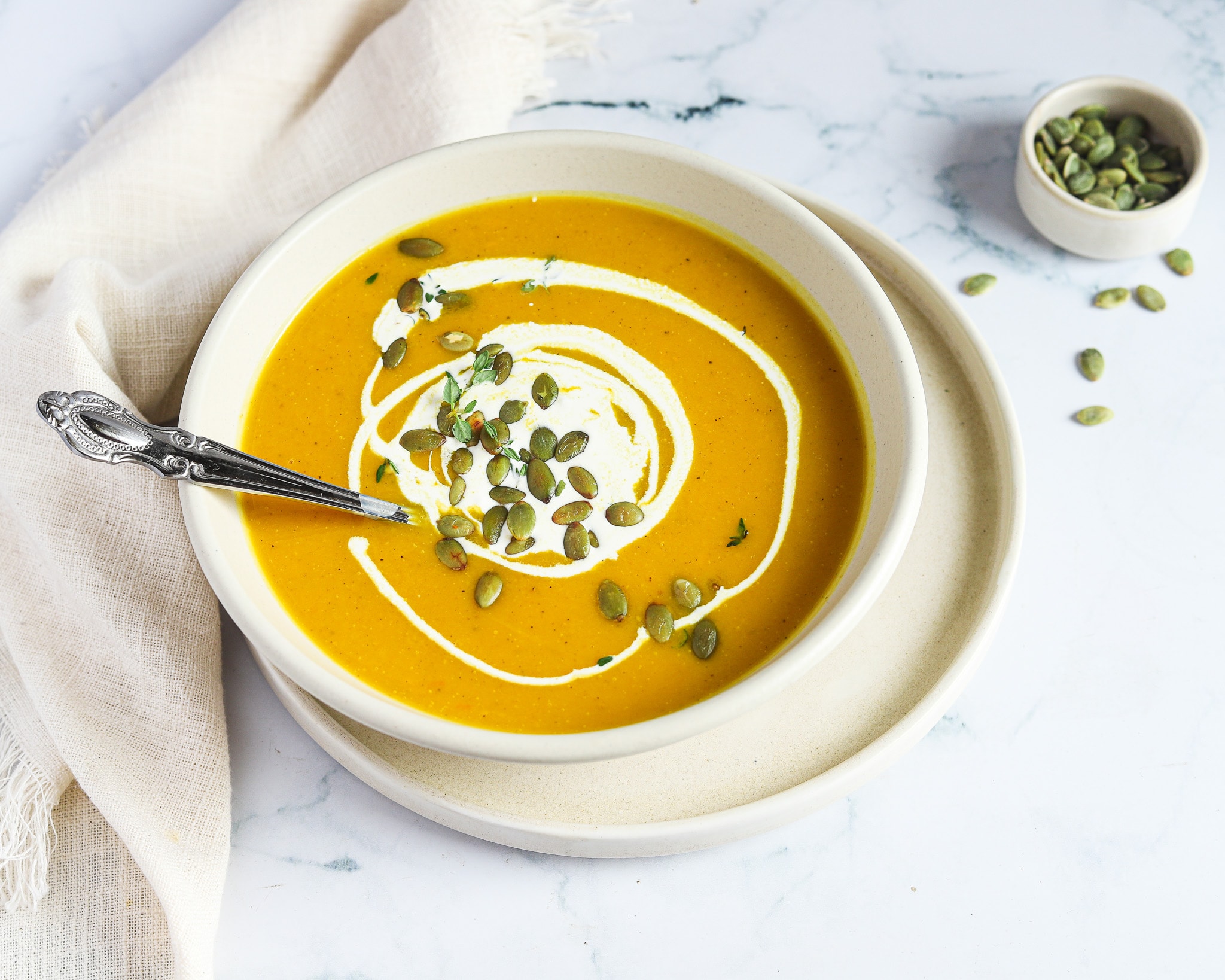 Roasted Pumpkin Soup in white bowl