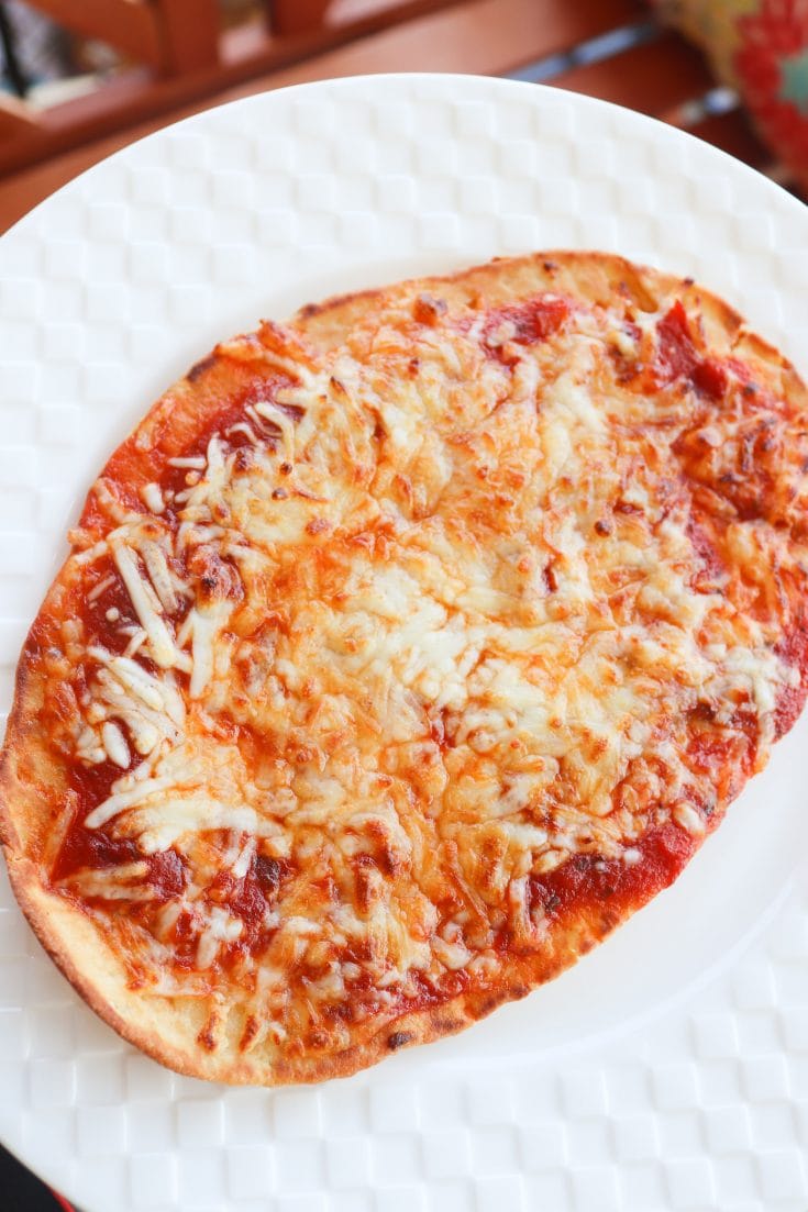 A super easy and quick meal for the family. Air Fryer Pizza has 4 easy ingredients and can be made in only 15 minutes!