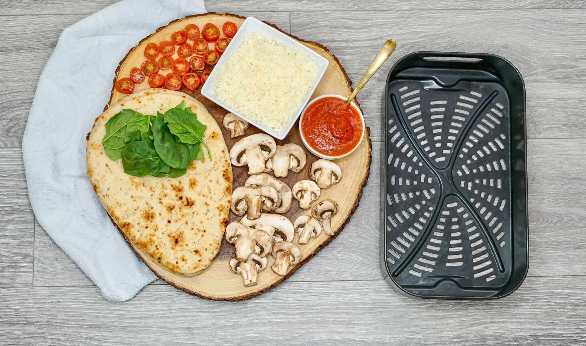 https://brooklynactivemama.com/wp-content/uploads/2021/04/Air-Fryer-Veggie-Flat-Bread-Pizza-11.jpg