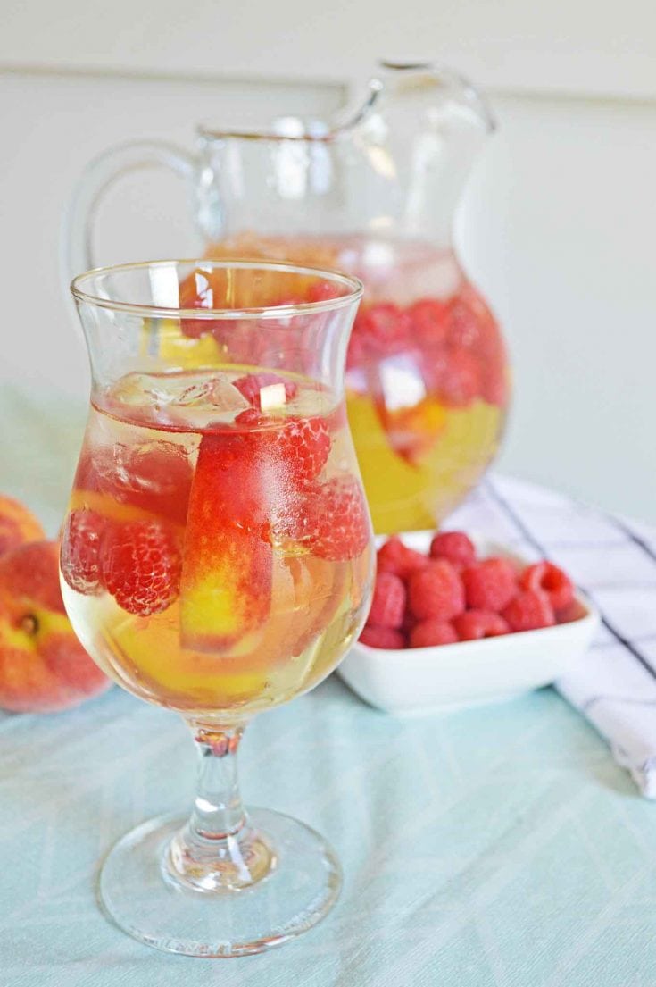 Sweet Wine Peach Sangria Recipe With Fresh Peaches and Raspberries