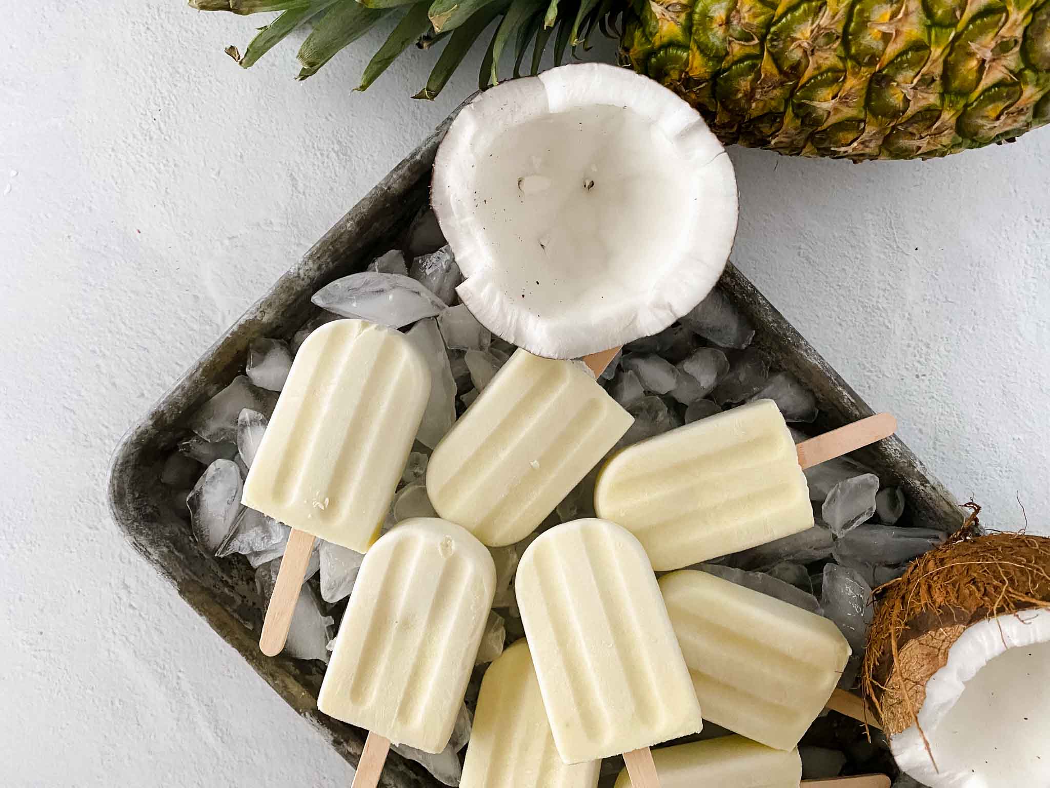 https://brooklynactivemama.com/wp-content/uploads/2022/04/Homemade-Virgin-Pina-Colada-Popsicles-01.jpg