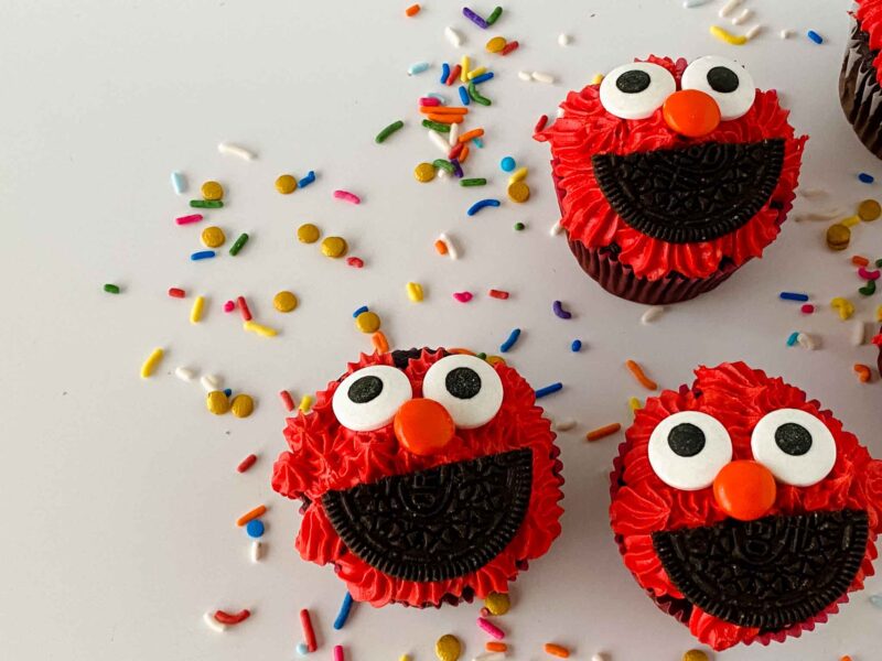 three elmo cupcakes