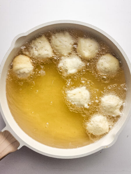 Homemade Dunkin Glazed Munchkins process deep frying